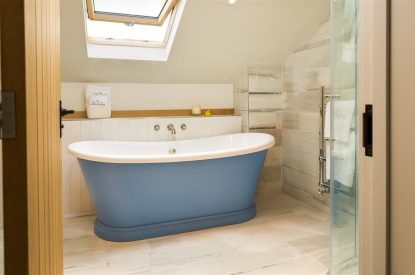 A roll top bath tub at The Old Grain Store, Lake District