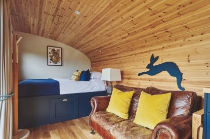 The living area and bed at Padley Cabin, Peak District