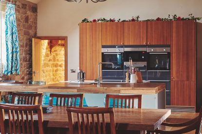 The kitchen and dining area at Woodpecker Loft, Peak District