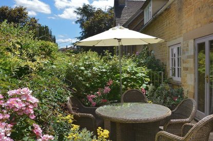An outdoor dining area at Wordsworth Cottage, Cotswolds