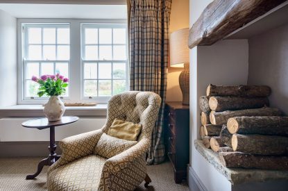 The living room with a log burner at Pen y Bryn, Abersoch