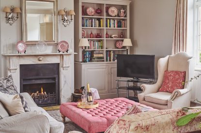 The living room with log burner at Hardy Cottage, Cotswolds