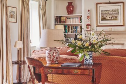 A desk in the living room at Wordsworth Cottage, Cotswolds