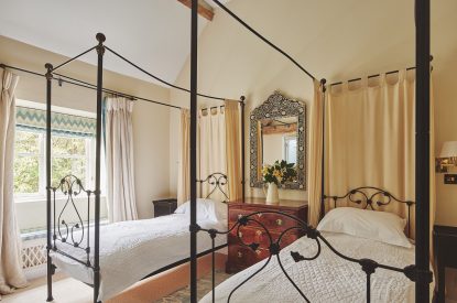 A twin bedroom at Milton Cottage, Cotswolds