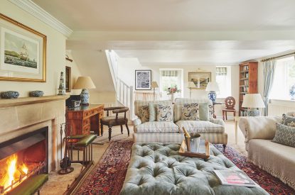 The living room with fireplace at Blake Cottage, Cotswolds