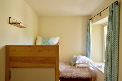 A bedroom at Buckfast Cottage, Devon
