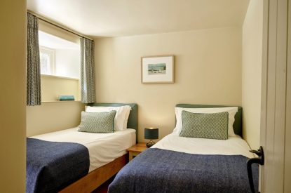 A bedroom at Buckfast Cottage, Devon