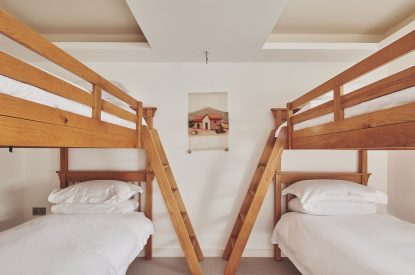 A bedroom with bunk beds at The Crewhouse, Hampshire