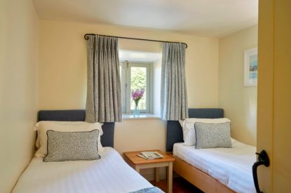 A bedroom at Tigley Cottage, Devon