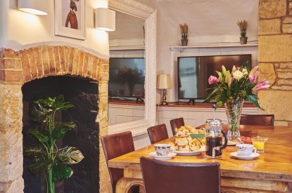 The dining table at Crooked Cottage, Cotswolds