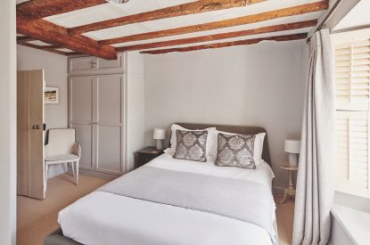 A bedroom at Crooked Cottage, Cotswolds