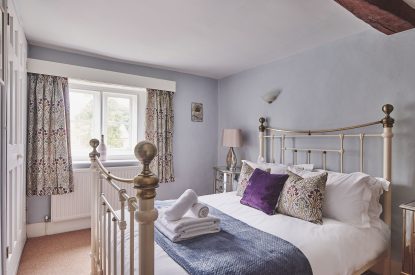 A bedroom at Church View Cottage, Cotswolds