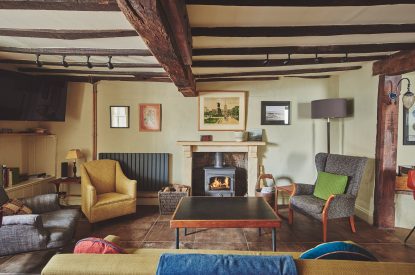 The living room with log burner at Hay Market House, Powys
