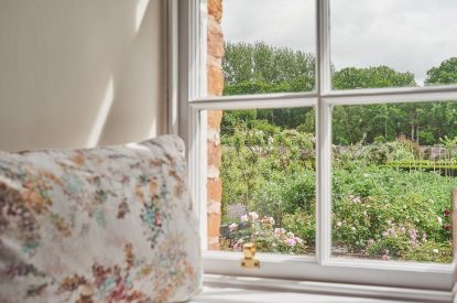 A bedroom at Gardeners Cottage, Cumbria