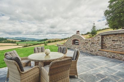 Outdoor dining area at Upper Tumble Cottage, Shropshire Hills