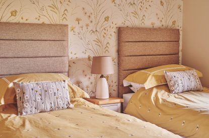 A twin bedroom at Upper Tumble Cottage, Shropshire Hills