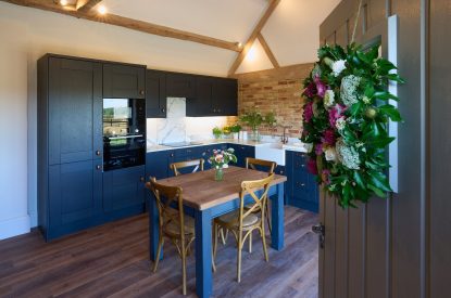 The kitchen and dining table in Stable Barn, Cotswolds