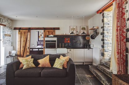 The kitchen and lounge area at Sunflower Cottage, Vale of Glamorgan