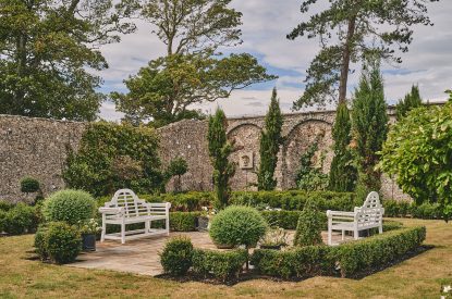 Benches in the shared garden at Muscari Cottage, Vale of Glamorgan