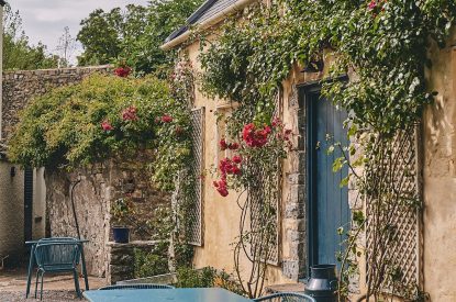 A shared seating area in the courtyard The exterior at Camassia Cottage, Vale of Glamorgan