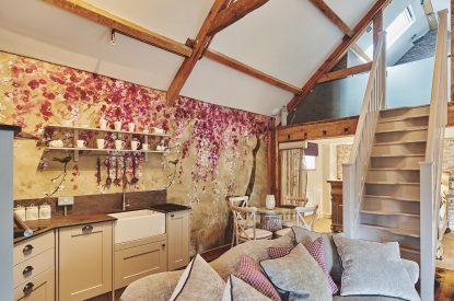 The kitchen and four-seater dining table at Hollyhock Cottage, Vale of Glamorgan