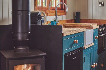 The kitchen and wood-burning stove at The Hangout Hut, Worcestershire 
