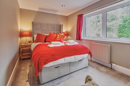 A bedroom at Loch Ness Mansion, Scottish Highlands