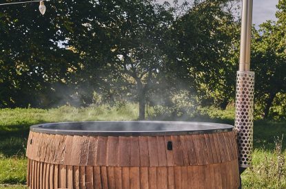 The wood-fired hot tub at Orchard Snug, Somerset