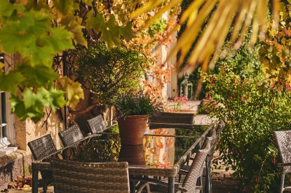 An outdoor dining area at Roupel Estate, Devon