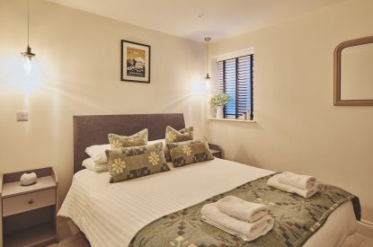 A bedroom at Ty Alice, Gower