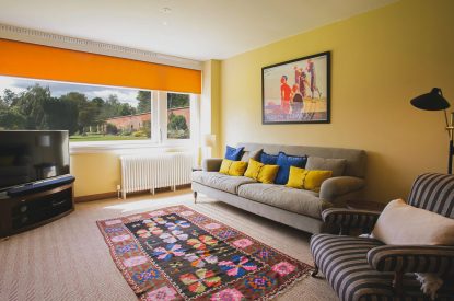 A living room with garden view at The Garden House, Edinburgh
