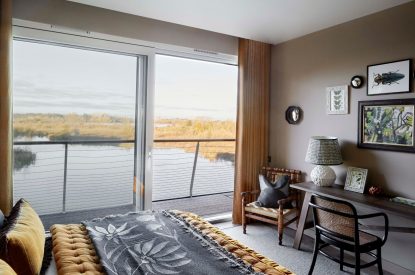 A bedroom with lake view at The Reserve, Cotswolds
