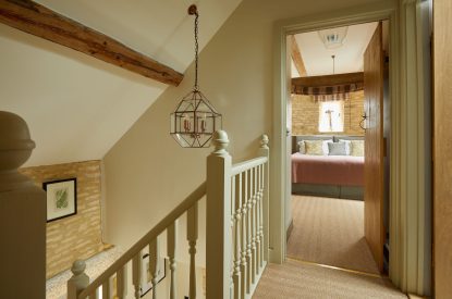 The hallway leading to the bedroom at Orchard Stable, Cotswolds