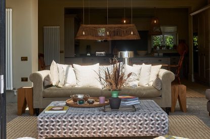 A sofa at Lakeside Manor, Cotswolds