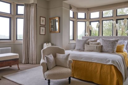 The master bedroom at Lakeside Manor, Cotswolds