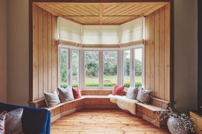 The living room window seat at The Old Vicarage, Lake District