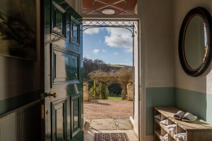 The entrance hall overlooking the countryside at Kittiwake House, Devon