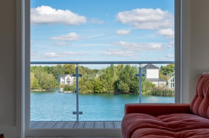 The view from the living room at Lakefront Lodge, Cotswolds