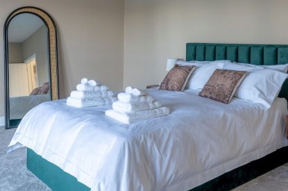 A double bedroom at Lakefront Lodge, Cotswolds