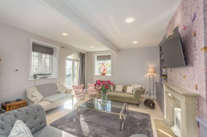The living room with fireplace at Rose Cottage, Isle of Wight