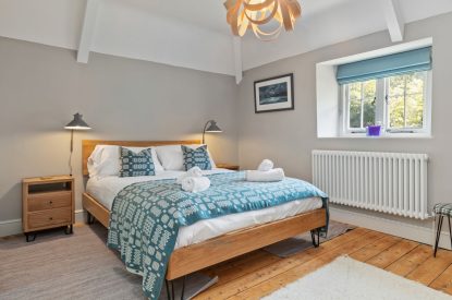 A bedroom at Teacher's Cottage, Gower