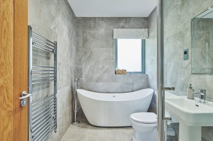 A bathroom with free standing bath at Bonnie Brae, Scottish Borders