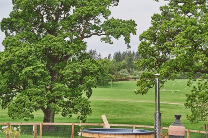 The garden with hot tub at Bonnie Brae, Scottish Borders