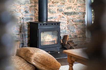 A log burner at Chapel Cottage, Pembrokeshire