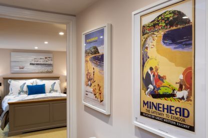 A corridor leading to a large double bedroom at Exmoor Barn, Somerset