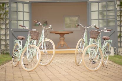 Four bikes outside of the cottage at Brickworks and Vines, Isle of Wight