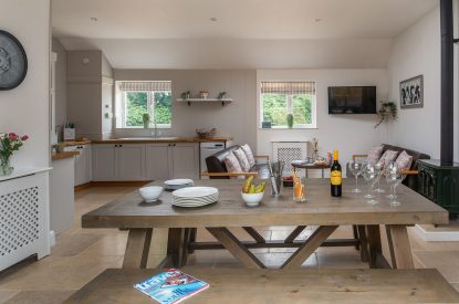 The picnic bench style dining table at Farmyard Cottage, Wiltshire