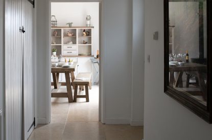 A hallway leading to the dining room at Farmyard Cottage, Wiltshire