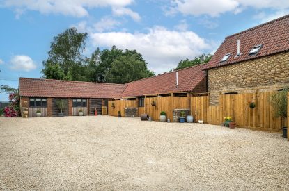 The driveway and exterior of Farmyard Cottage, Wiltshire