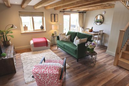 The open-plan living room at Piglet's Hideaway, Cotswolds